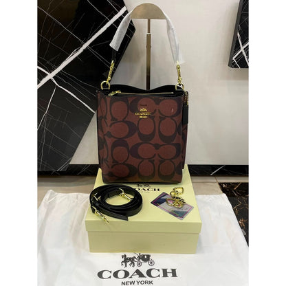 COACH MOLLIE 22 BUCKET SIGNATURE CANVAS BAG