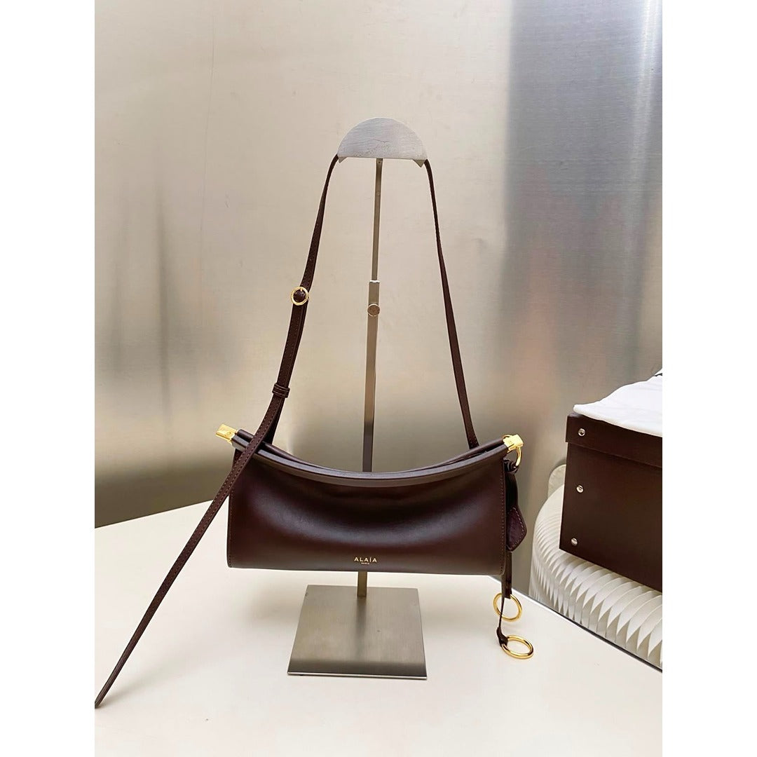 ALAÏA NOIR LE CLICK EAST WEST MEDIUM CURVE BAG