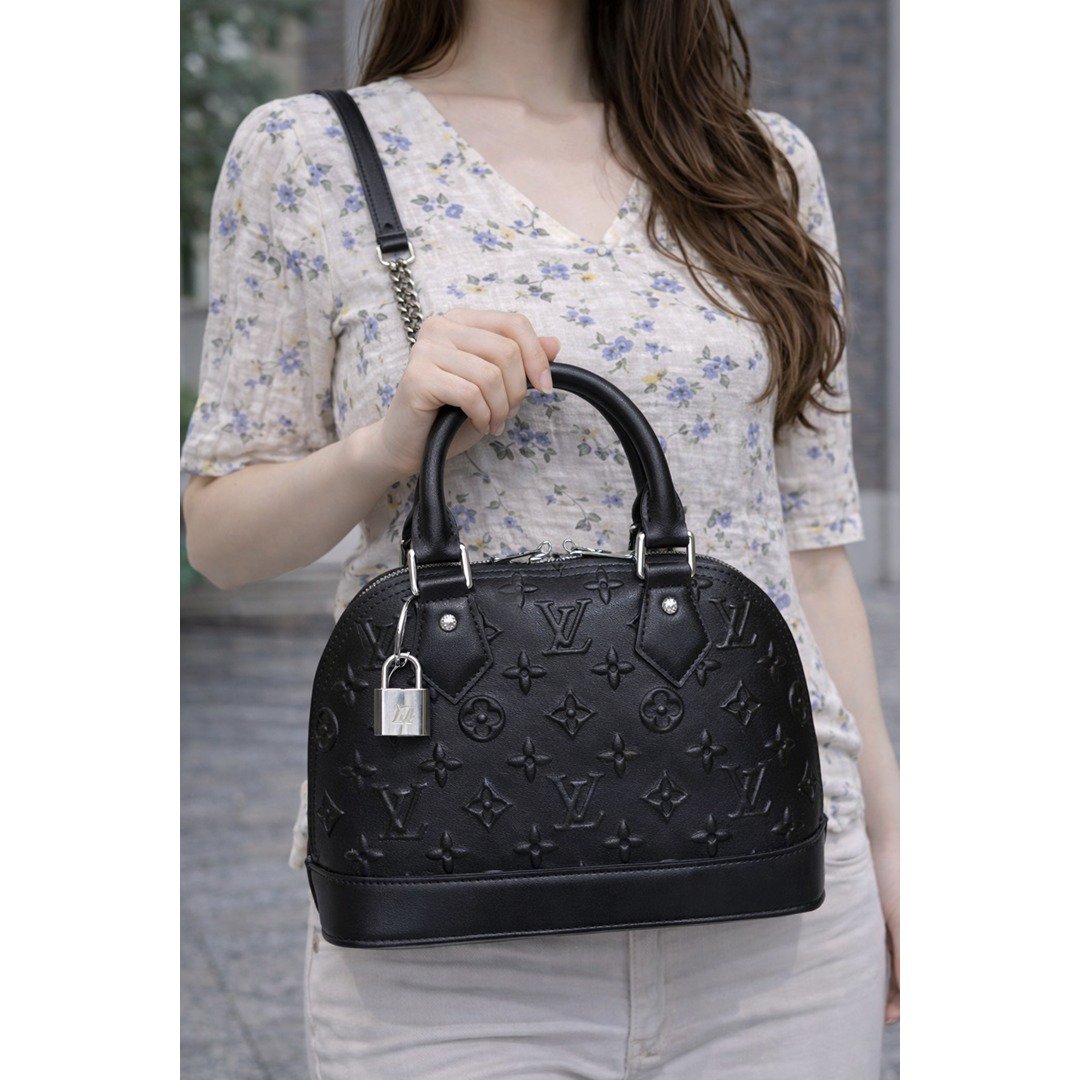 LOUIS VUITTON NEO ALMA BLACK MONOGRAM HANDBAG