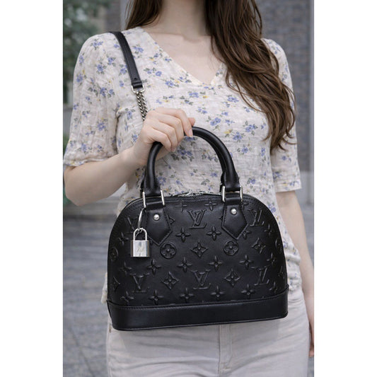 LOUIS VUITTON NEO ALMA BLACK MONOGRAM HANDBAG