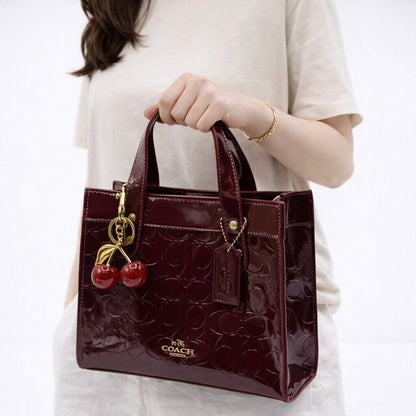 COACH SIGNATURE PATENT MINI TOTE BAG WITH CHERRY CHARM