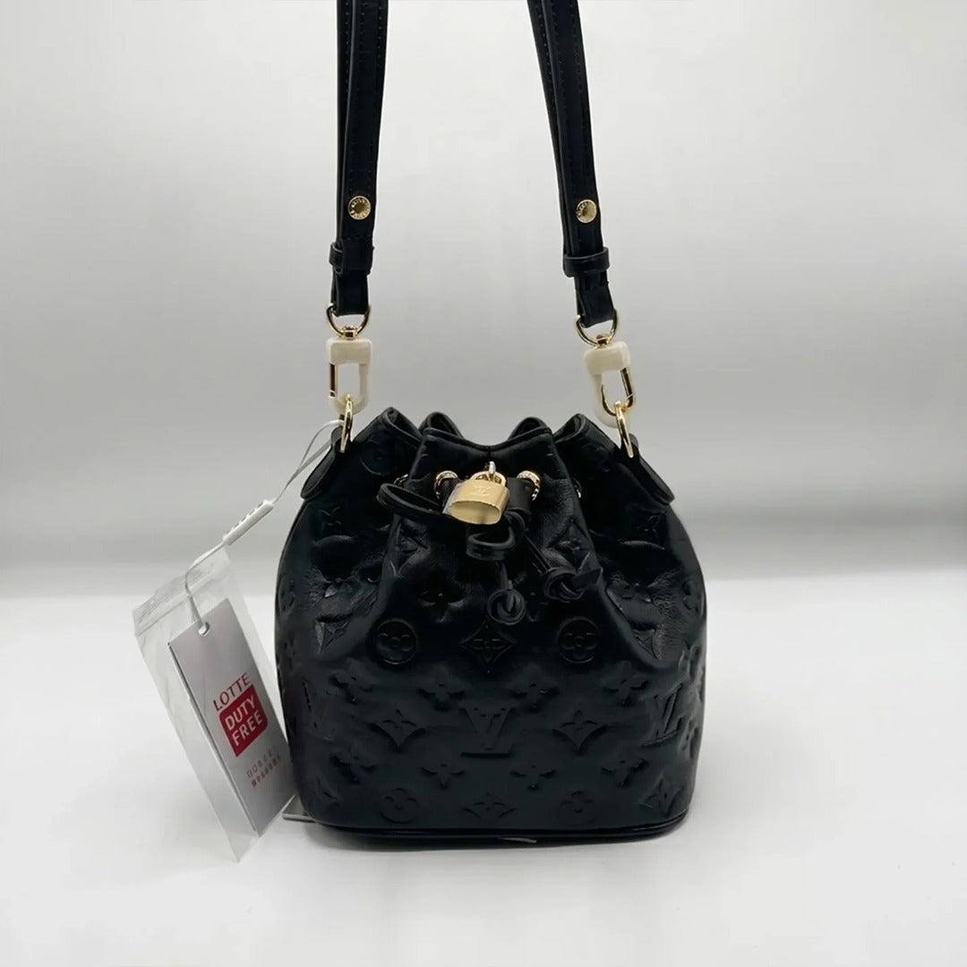 LOUIS VUITTON COUSSIN MONOGRAM EMBOSSED BUCKET BAG