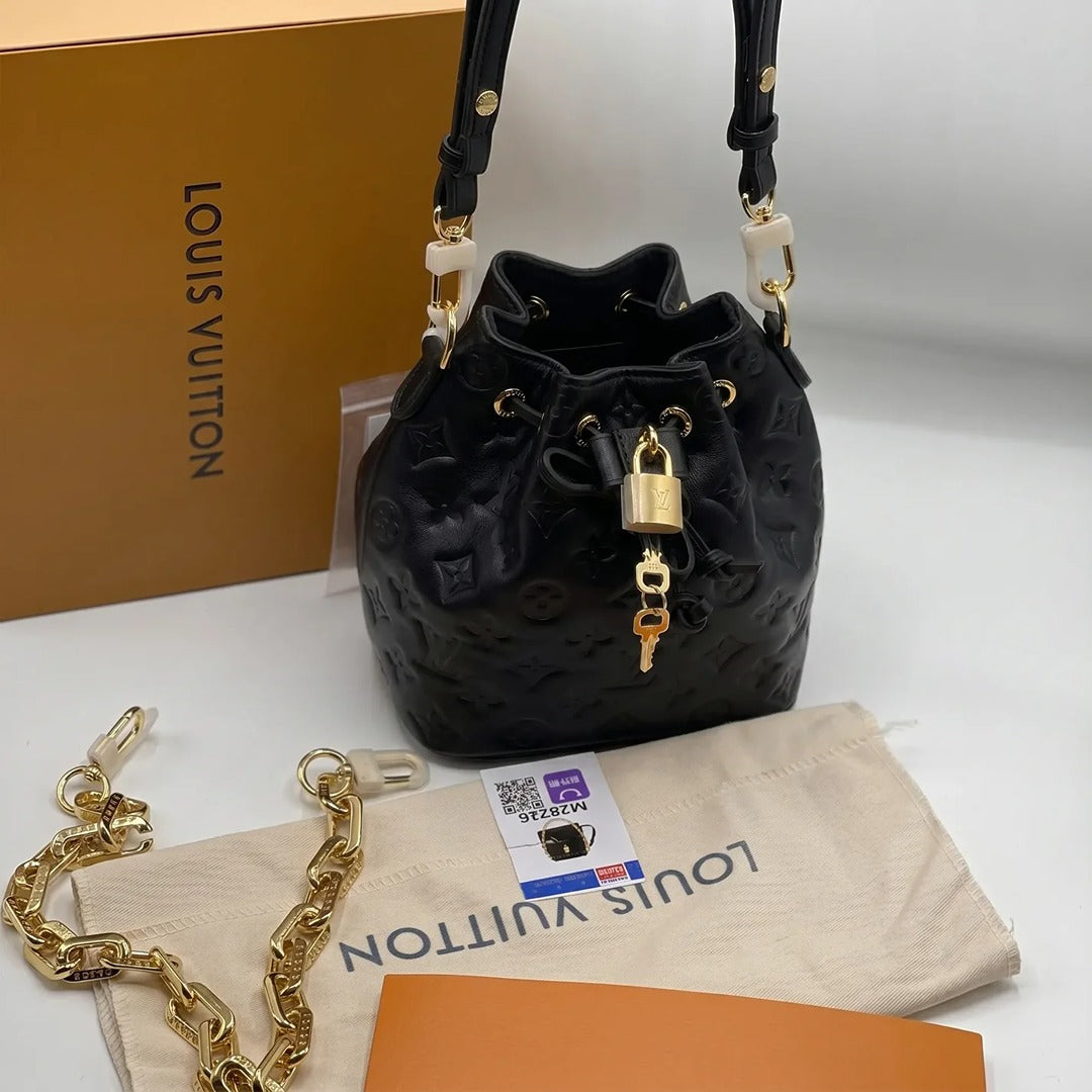 LOUIS VUITTON COUSSIN MONOGRAM EMBOSSED BUCKET BAG
