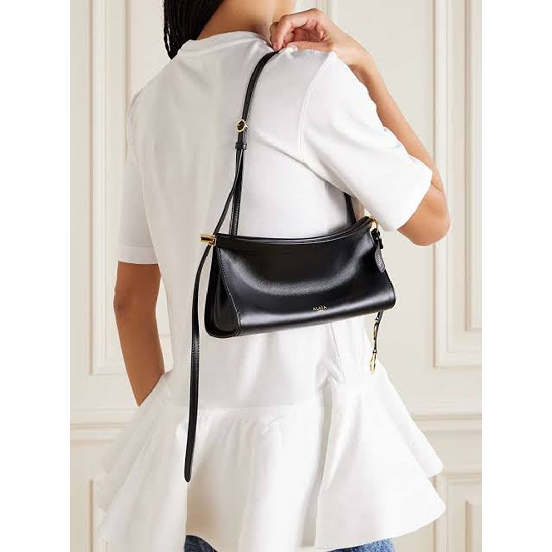 ALAÏA NOIR LE CLICK EAST WEST MEDIUM CURVE BAG