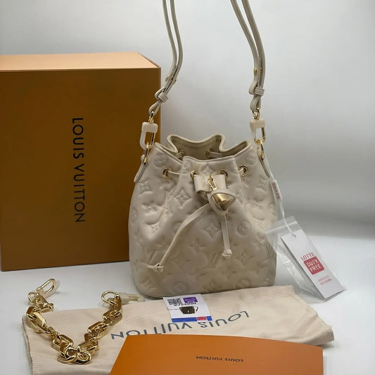 LOUIS VUITTON COUSSIN MONOGRAM EMBOSSED BUCKET BAG