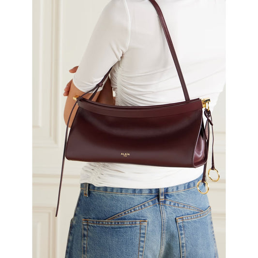 ALAÏA NOIR LE CLICK EAST WEST MEDIUM CURVE BAG
