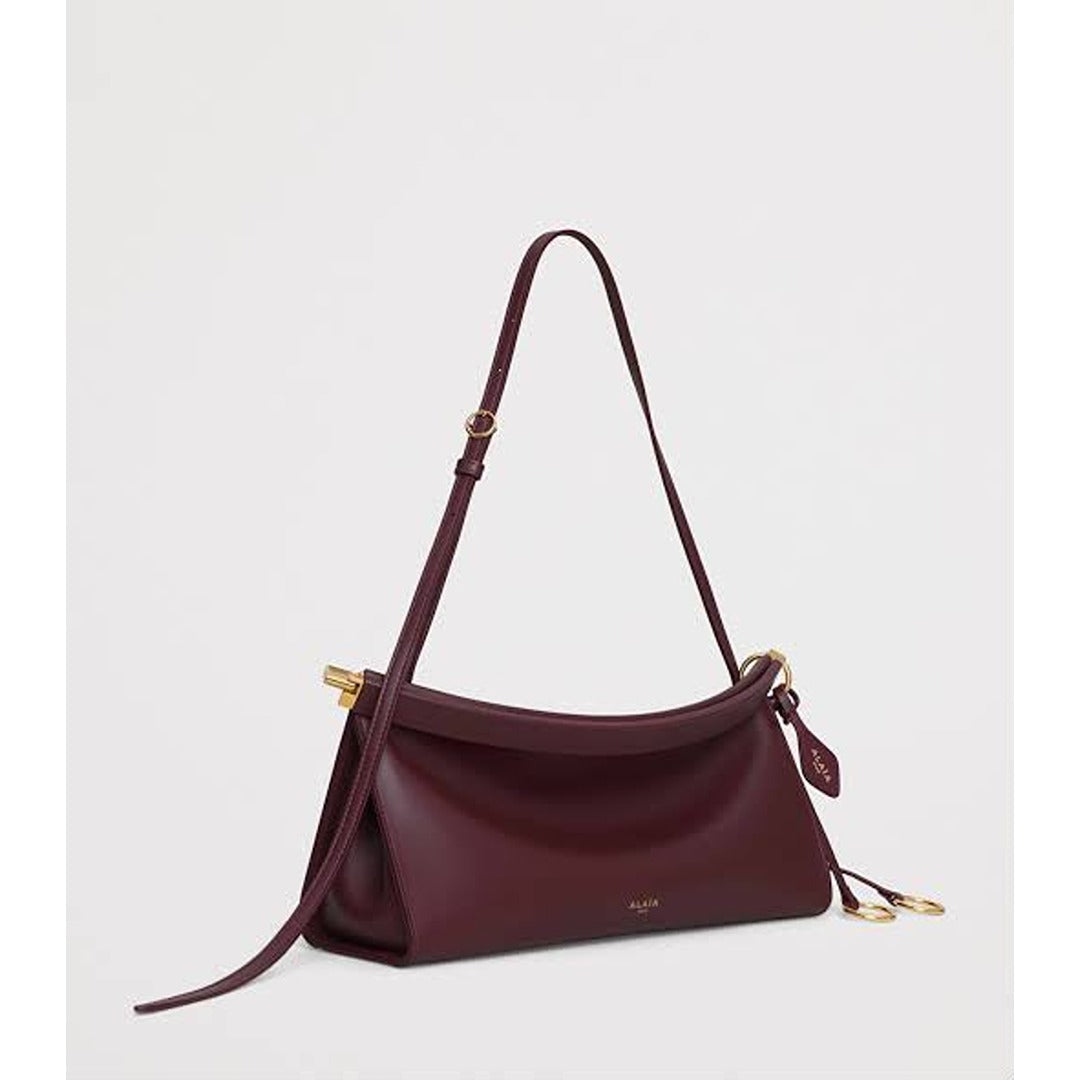 ALAÏA NOIR LE CLICK EAST WEST MEDIUM CURVE BAG