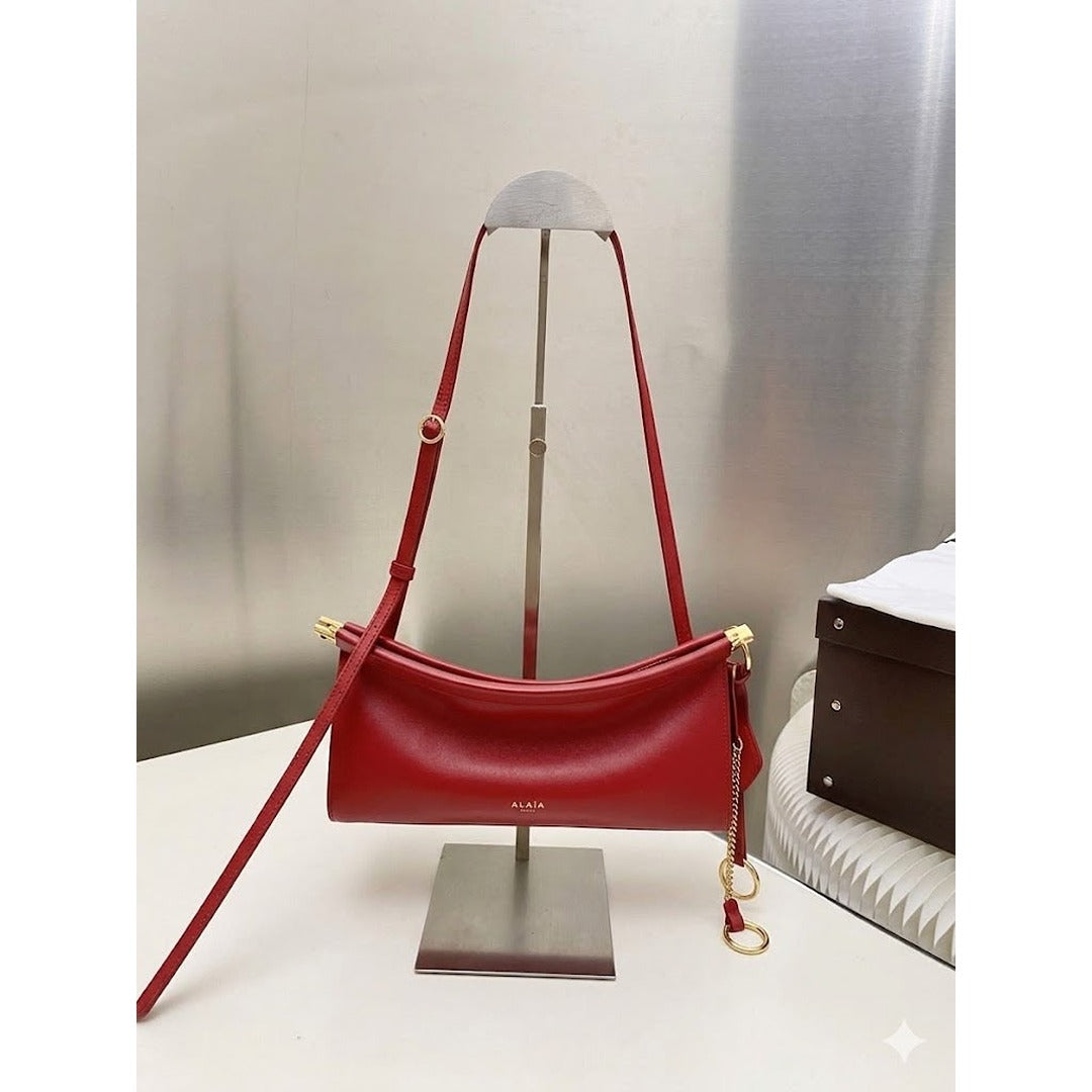 ALAÏA NOIR LE CLICK EAST WEST MEDIUM CURVE BAG