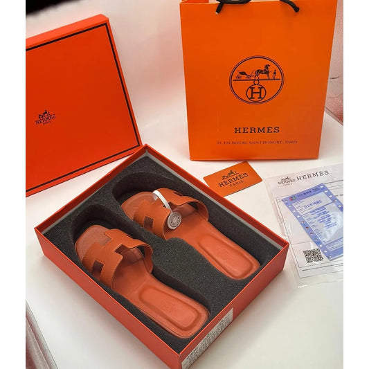 HERMES H CUT OUT ORAN DARK ORANGE SLIPPERS